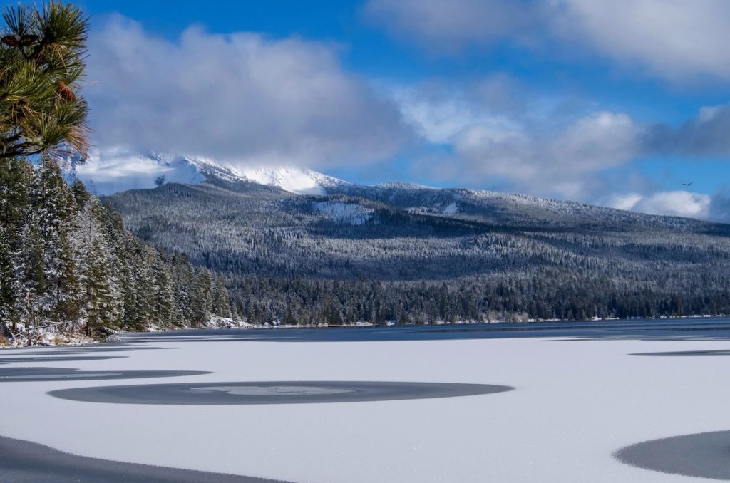 Partly frozen lake in Oregon. This lake is called Diamond Lake and is one of the best kept secrets of the state.