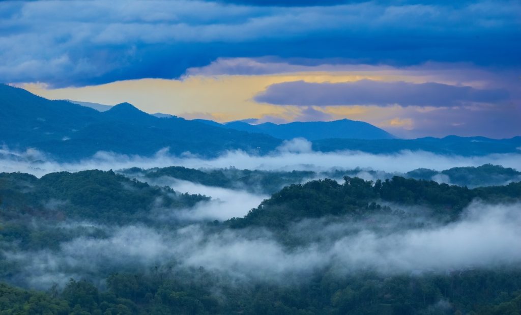 Early morning fog over Gatlinburg and the Smoky Mountains of Tennessee USA